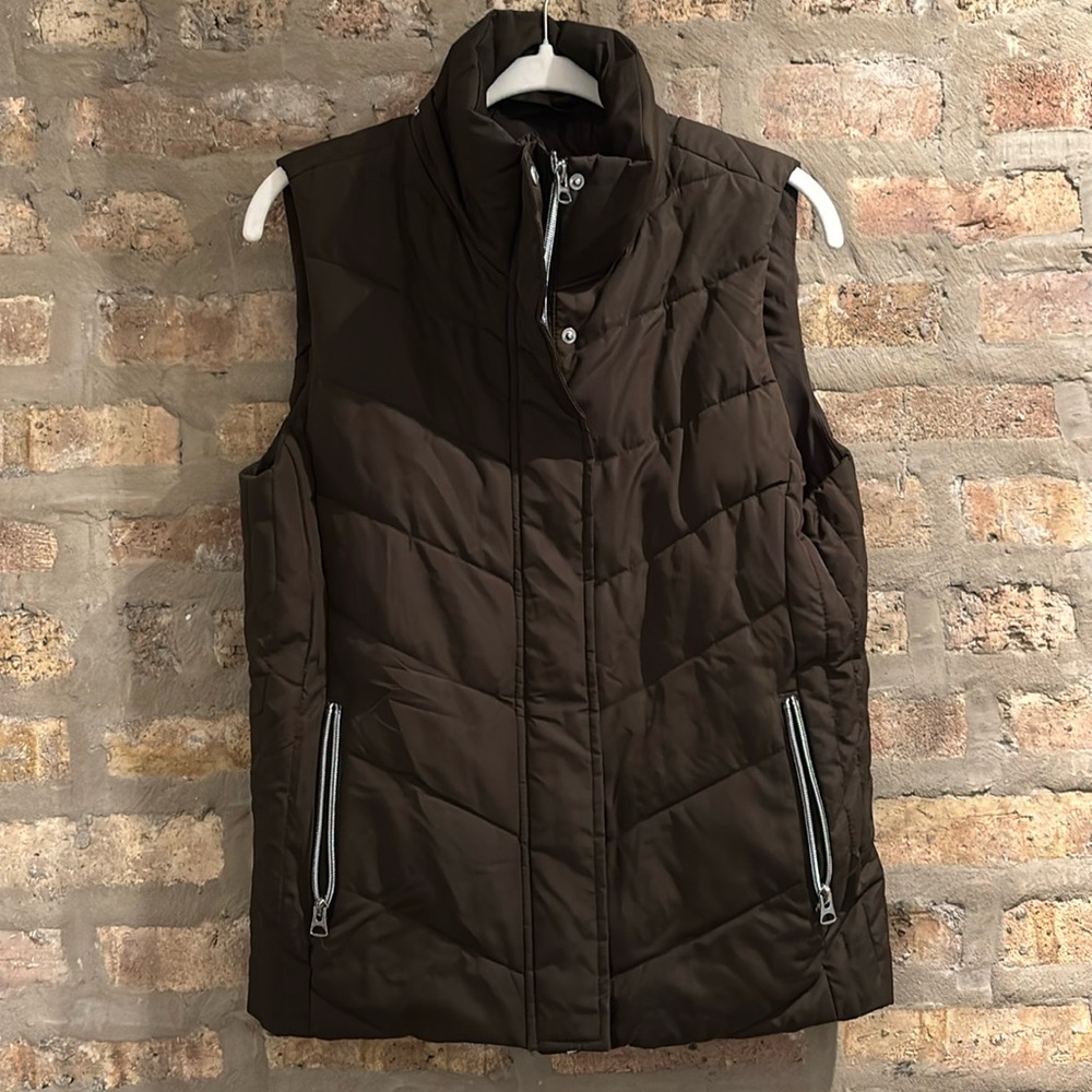 Olive green/brown vest with detachable furry hood. Hardly worn - great condition